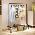 Single Pole Cloth Hanging Stand with Single Shoes Rack featuring hanging clothes and a shoe storage area below.
