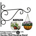 Wall Mounted Flower Pot Hanger Stand by Metallics Home features a decorative black metal design for hanging planters.