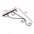 Wall Mounted Flower Pot Hanger Stand by Metallics Home features a black metal design with decorative scrolls, measuring 20.5c
