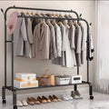 Metal Clothes Stand by Metallics Home featuring hanging space for garments, side storage shelves, hooks, and a shoe rack.