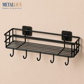 Wall-Mounted Adhesive Shelf by Metallics Home features a black metal wire design with five hooks, ideal for storage and organ