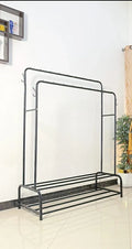 Dual Pole Metal Clothes Stand by Metallics Home featuring dual shoe tiers, sturdy black metal frame, and multiple hooks.