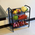 Multipurpose Foldable Kitchen Trolley by Metallics Home with four mesh shelves, holding various fruits and vegetables.