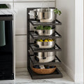 Floor Standing Kitchen Shelf by Metallics Home featuring four shelves with stainless steel pots and a woven basket for storag