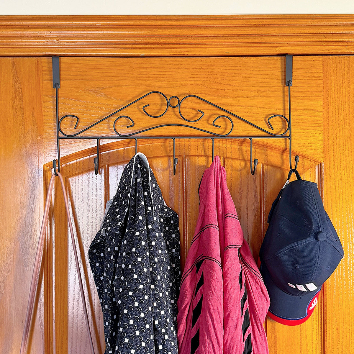 Set of 3 Over the Door Hangers by Metallics Home, featuring decorative hooks for hanging coats, scarves, and hats.